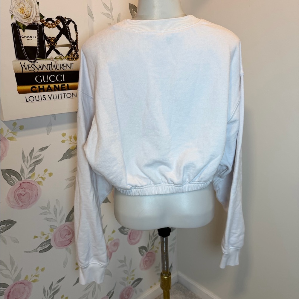 Alo Yoga Devotion Crewneck Pullover
in white. - Picture 4 of 6